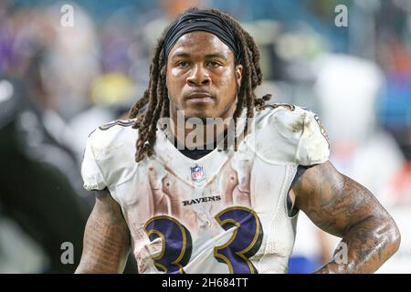 Baltimore Ravens running back Devonta Freeman runs the ball against the  Detroit Lions in the first half of an NFL football game in Detroit, Sunday,  Sept. 26, 2021. (AP Photo/Tony Ding Stock