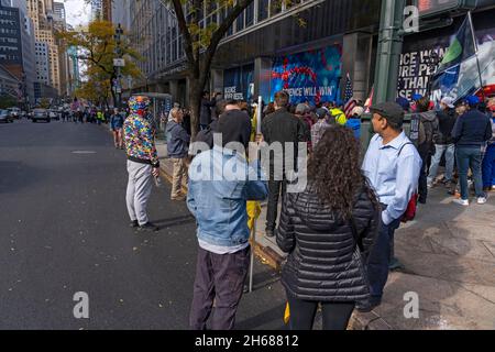 New York, United States. 13th Nov, 2021. NEW YORK, NY - NOVEMBER 13: A small group far-right America First and a larger group of city employees held separate protests in front of Pfizer world headquarters on November 13, 2021 in New York City. A U.S. Circuit Court granted an emergency stay to temporarily stop the Biden administration's vaccine requirement for businesses with 100 or more workers as many feel it is an unlawful overreach. Credit: Ron Adar/Alamy Live News Stock Photo