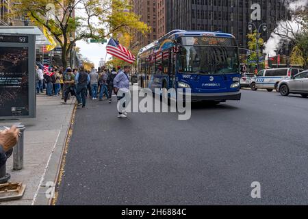 New York, United States. 13th Nov, 2021. NEW YORK, NY - NOVEMBER 13: A small group far-right America First and a larger group of city employees held separate protests spilling to the street and hinder traffic in front of Pfizer world headquarters on November 13, 2021 in New York City. A U.S. Circuit Court granted an emergency stay to temporarily stop the Biden administration's vaccine requirement for businesses with 100 or more workers as many feel it is an unlawful overreach. Credit: Ron Adar/Alamy Live News Stock Photo
