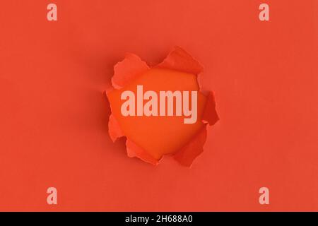 Red torn paper with space for text with red background Stock Photo