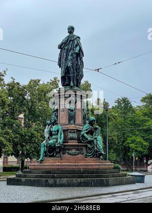 Maxmonument (1875), statue of Maximillian II by Kaspar von Zumbusch on Maximilianstrasse, Munich, Germany Stock Photo