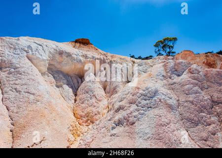 Buckley’s Breakaway is a picturesque landform where erosion has cut through the orange laterite and formed spectacular white cliffs and gullies from t Stock Photo
