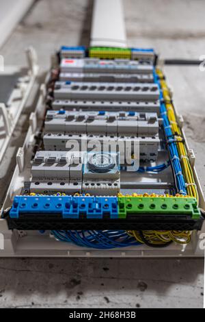 Voltage switchboard with circuit breakers, close up. Stock Photo