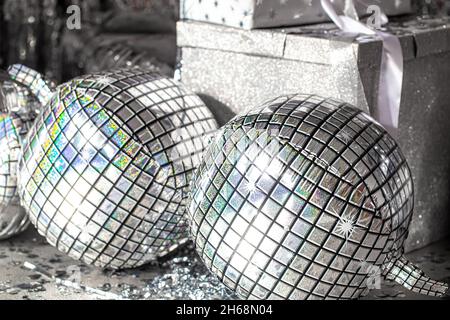Christmas background with silver glittering holiday balls. Stock Photo