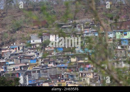 Mumbai, Maharashtra, India, November 13 2021: Slum coming up in Vikhroli, a Mumbai suburb near to Powai, India. A squalid and overcrowded urban area i Stock Photo