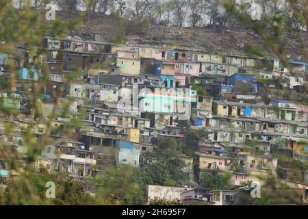 Mumbai, Maharashtra, India, November 13 2021: Slum coming up in Vikhroli, a Mumbai suburb near to Powai, India. A squalid and overcrowded urban area i Stock Photo