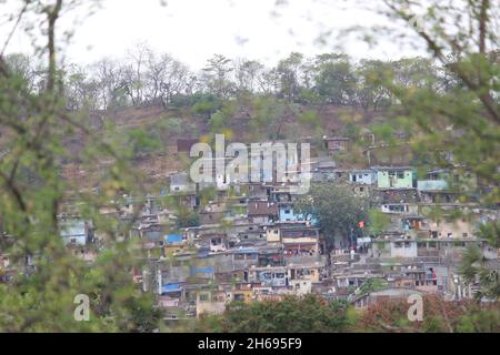 Mumbai, Maharashtra, India, November 13 2021: Slum coming up in Vikhroli, a Mumbai suburb near to Powai, India. A squalid and overcrowded urban area i Stock Photo