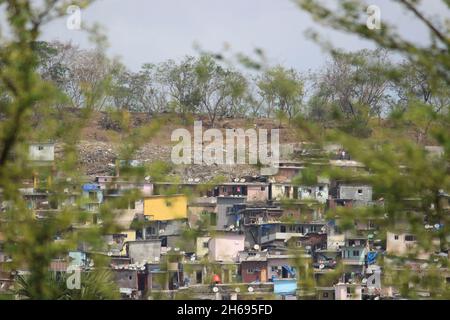 Mumbai, Maharashtra, India, November 13 2021: Slum coming up in Vikhroli, a Mumbai suburb near to Powai, India. A squalid and overcrowded urban area i Stock Photo