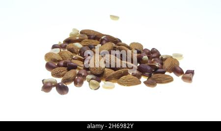 Almond mixed isolated on a white background close up shot.Almond isolated background with enough copy space for text. Stock Photo