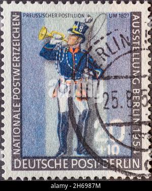 GERMANY, Berlin - CIRCA 1954: a postage stamp from Germany, Berlin showing a Prussian postillon around 1827 occasion: National Stamp Exhibition 1954 B Stock Photo