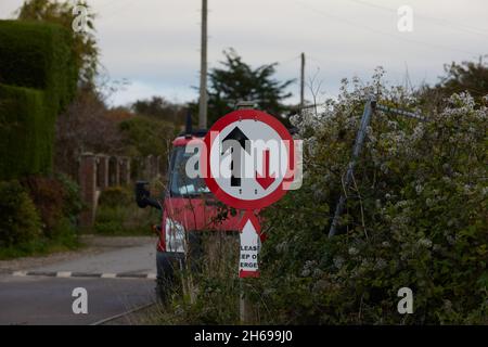 Road sign of oncoming vehicles have to give way. Stock Photo