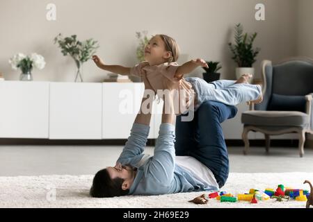 child pretending to be strong man Stock Photo - Alamy