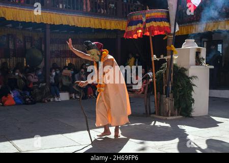 Marpha, Nepal - November 2021: Lama dance at the Marpha Buddhist Monastery in the Mustang district on November 3, 2021 in Marpha, Nepal. Stock Photo