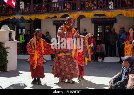 Marpha, Nepal - November 2021: Lama dance at the Marpha Buddhist Monastery in the Mustang district on November 3, 2021 in Marpha, Nepal. Stock Photo