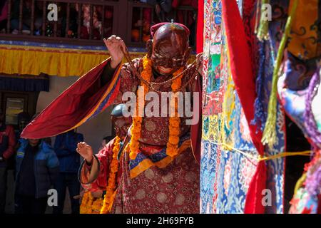 Marpha, Nepal - November 2021: Lama dance at the Marpha Buddhist Monastery in the Mustang district on November 3, 2021 in Marpha, Nepal. Stock Photo