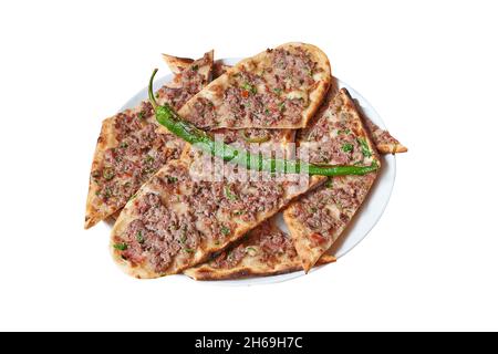Overhead view on Turkish Pide on Plate  isolated on white with clipping path Stock Photo