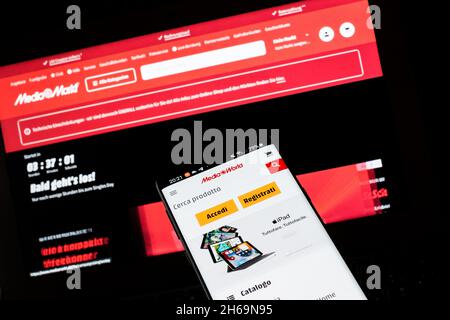 November 10, 2021, Rome, Italy: Photo composition of the commercial chain ''MediaWorld MediaMarkt '' represented the web page has been hit by a hacker attack, more than 3000 servers of the company MediaMarkt - which controls the well-known chain of electronics shops - have been hit by a ransomware, i.e. a type of malware virus that blocks access to computer systems and unlocks them only after the payment of a ransom, 'a ransom' to be precise. In this case, the ransom would amount to $50 million to be paid in cryptocurrency. (Credit Image: © Andrea Ronchini/Pacific Press via ZUMA Press Wire) Stock Photo