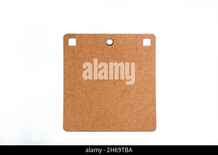 Large brown carton price tag with metal ring hole and with copy space isolated on white background - clipping path included Stock Photo