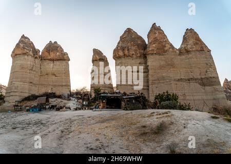 The rocky formations at the Love Valley on a sunny day in Cappadocia, Turkey Stock Photo