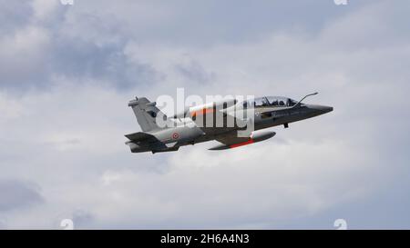 Rivolto del Friuli, Udine, Italy SEPTEMBER, 17, 2021 Aermacchi MB-339 military jet training and light attack airplane of Italian Air Force in the blue sky painted in NATO grey Stock Photo