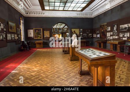 Exposition hall in the Joseph Stalin museum with attributes, photograps and statues of him in Gori,  Shida Kartli, Georgia, Caucasus Stock Photo