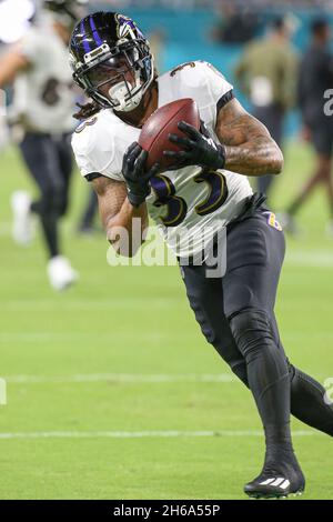 Baltimore Ravens running back Devonta Freeman runs the ball against the  Detroit Lions in the first half of an NFL football game in Detroit, Sunday,  Sept. 26, 2021. (AP Photo/Tony Ding Stock