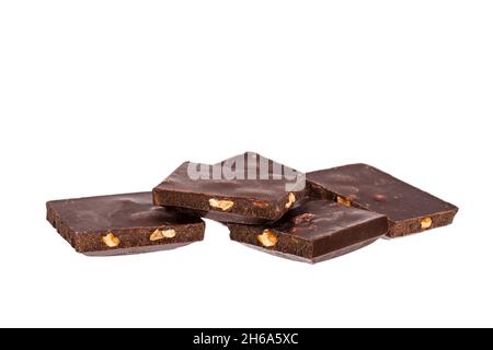 pieces of dark chocolate with nuts lie side by side isolated on white background. High quality photo Stock Photo