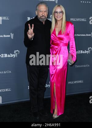 West Hollywood, United States. 13th Nov, 2021. WEST HOLLYWOOD, LOS ANGELES, CALIFORNIA, USA - NOVEMBER 13: American entrepreneur John Paul DeJoria and wife Eloise Broady DeJoria arrive at the Baby2Baby 10-Year Gala 2021 held at the Pacific Design Center on November 13, 2021 in West Hollywood, Los Angeles, California, United States. (Photo by Xavier Collin/Image Press Agency/Sipa USA) Credit: Sipa USA/Alamy Live News Stock Photo