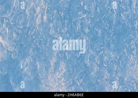 Winter theme background with frozen blue ice in it Stock Photo - Alamy