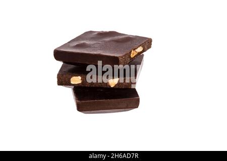 three pieces of chocolate with nuts lie side by side isolated on white background. High quality photo Stock Photo