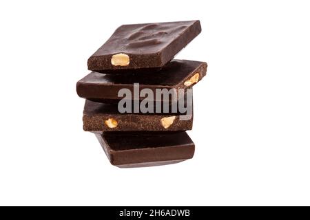 pieces of chocolate with nuts lie side by side isolated on white background. High quality photo Stock Photo