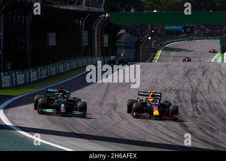 44 HAMILTON Lewis (gbr), Mercedes AMG F1 GP W12 E Performance, 11 PEREZ Sergio (mex), Red Bull Racing Honda RB16B, action during the Formula 1 Heineken Grande Premio De Sao Paulo 2021, Sao Paulo Grand Prix, 19th round of the 2021 FIA Formula One World Championship from November 12 to 14, 2021 on the Interlagos Circuit, in Sao Paulo, Brazil - Photo Florent Gooden / DPPI Stock Photo