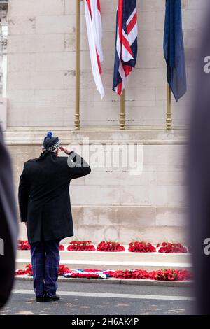 London, UK. 14th Nov, 2021. A dignitary salutes after laying his poppy wreath on the Cenotaph.The Remembrance Sunday Service is an annual ceremony held on the week of the Remembrance day, 11st Nov. National leaders, the Royal family and dignitaries come together to pay tribute to nationals who have fought and died in the two world war, as a celebration of world peace. Poppies are worn and poppy wreaths laid around the Cenotaphs as a practice. Credit: SOPA Images Limited/Alamy Live News Stock Photo