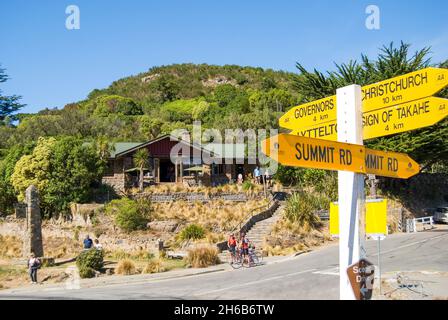 Sign post and Resthouse Cafe, Sign of the Kiwi, Port Hills, Christchurch, Canterbury, New Zealand Stock Photo