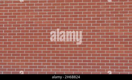 Full frame image of plain terracotta brick work suitable for use as wallpaper Stock Photo