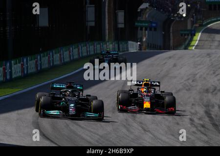 Sao Paulo, Brazil. 14th Nov, 2021. # 44 Lewis Hamilton (GBR, Mercedes-AMG Petronas F1 Team), # 11 Sergio Perez (MEX, Red Bull Racing), F1 Grand Prix of Brazil at Autodromo Jose Carlos Pace on November 14, 2021 in Sao Paulo, Brazil. (Photo by HOCH ZWEI) Credit: dpa/Alamy Live News Stock Photo