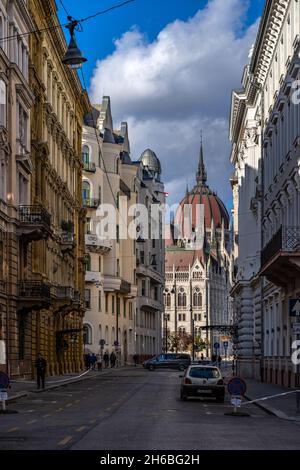 View of the Hungarian Parliament from Akademia street, one of the most beautiful streets in the world, Budapest, Hungary Stock Photo