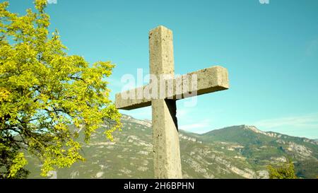 A photo of a cross in nature Stock Photo