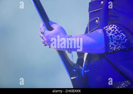 Hard rock musicians performing. Guitar neck Stock Photo