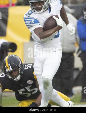 Detroit Lions running back Godwin Igwebuike (35) runs a route