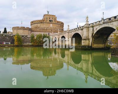 ROME, ITALY - Dec 20, 2018: A beautiful view of a bridge and Mausoleum of Hadrian; sightseeing in Rome on a warm December day, Stock Photo