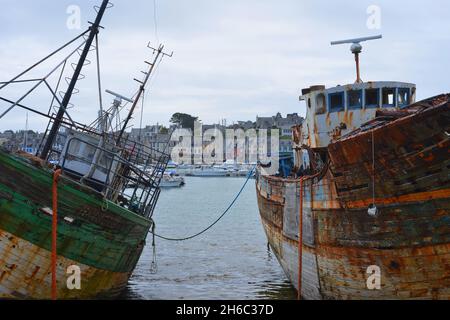 Camaret sur Mer, France old rusty fisher boats rotten in the harbor Stock Photo