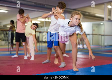 Young boys and girls on group self-protection training Stock Photo