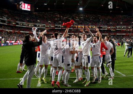 Lisbon, Portugal. 14th Nov, 2021. Serbia's players celebrate the victory after the FIFA World Cup Qatar 2022 Qualifying Group A football match between Portugal and Serbia at the Luz stadium in Lisbon, Portugal, on Nov. 14, 2021. Credit: Pedro Fiuza/Xinhua/Alamy Live News Stock Photo