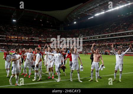 Lisbon, Portugal. 14th Nov, 2021. Serbia's team players celebrate the victory at the end the FIFA World Cup Qatar 2022 qualification group A football match between Portugal and Serbia at the Luz stadium in Lisbon, Portugal, on November 14, 2021. (Credit Image: © Pedro Fiuza/ZUMA Press Wire) Stock Photo