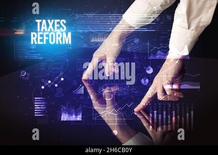 Businessman touching huge screen concept Stock Photo