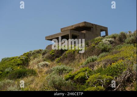 A pillbox with a view! This World War II gun emplacement was perched on the cliff at Point Nepean in Victoria, Australia. It guarded Port Phillip Bay. Stock Photo