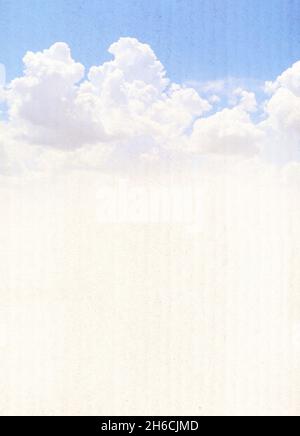 Grunge background with striped cardboard texture and white clouds. Vertical vintage nature backdrop. Paper cardboard background. Recycled carton mater Stock Photo