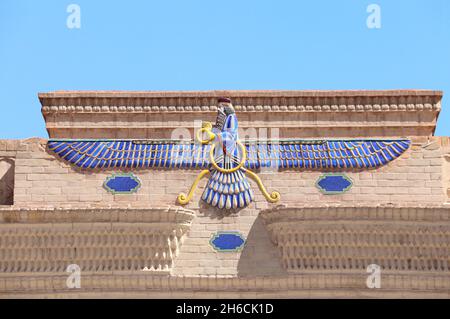 Sign of Zoroastrianism Faravahar (Frahvahar). Zoroastrian symbol on the temple wall, Yazd, Iran Stock Photo