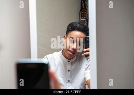 Selfie of a male Indonesian teenage Stock Photo